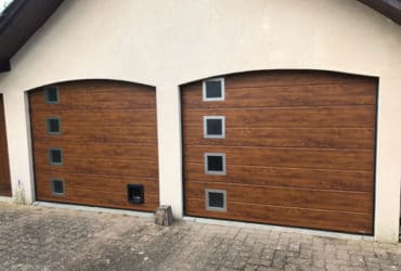 Fourniture et pose de 2 portes de garage sectionnelles alu (imitation bois) à Le Vernet 03