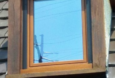 Fenêtre en bois avec volet roulant posés par votre installateur Solabaie JDS Rénovation à Verneuil