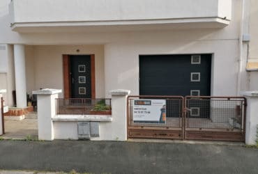 Remplacement d'une porte d'entrée et porte de garage à l'esthétique coordonnée